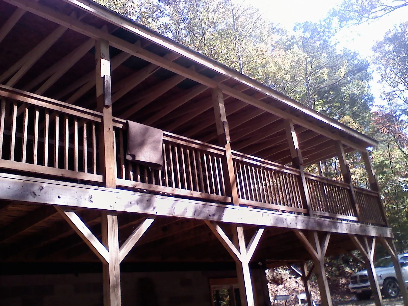 Timber framing under a new elevated porch and deck — Roof Leak Repair in Henrico by Roofing Brothers